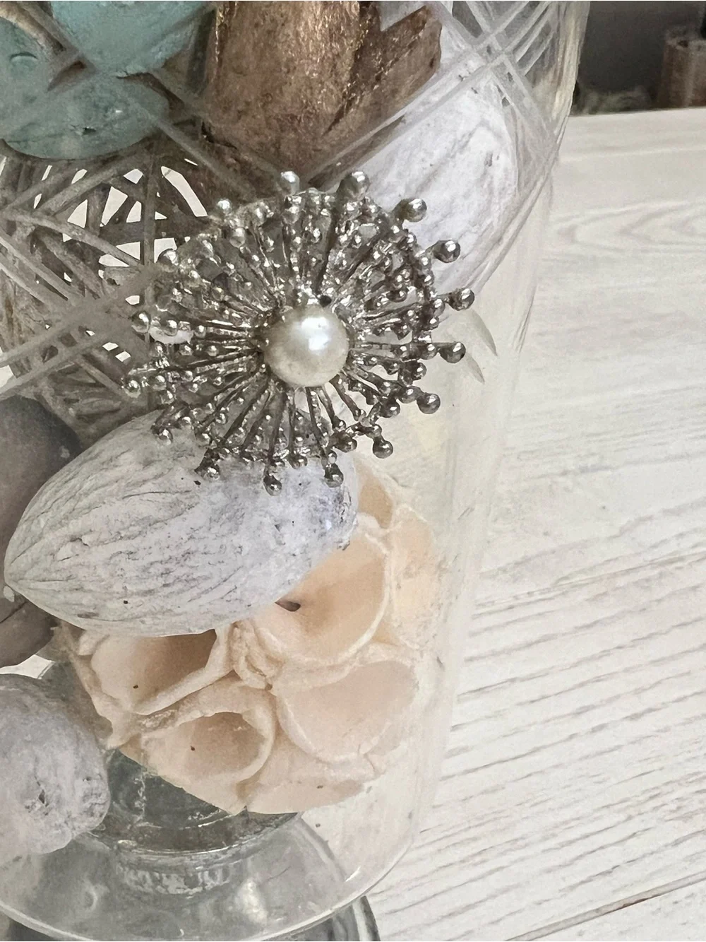 Glass Pedestal Hurricane Vase with Decorative White, Cream and Aqua Fillers